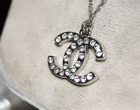 fake chanel logo necklaces|how to authenticate chanel earrings.